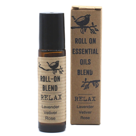 Roll-on essential oils blend with packaging on a white background