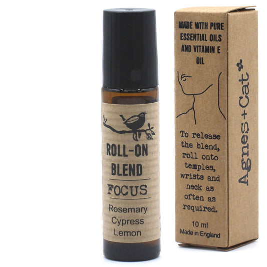 Roll-on blend bottle and box with 'Agnes + Cat' branding on a white background
