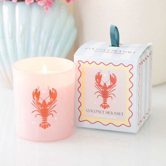 Candle with lobster design and packaging on a white background