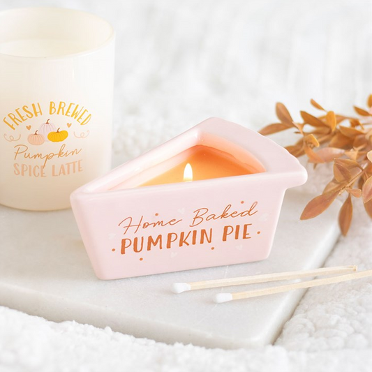 Candle labeled 'Home Baked Pumpkin Pie' with a smaller candle labeled 'Fresh Brewed Pumpkin Spice Latte' on a white background.
