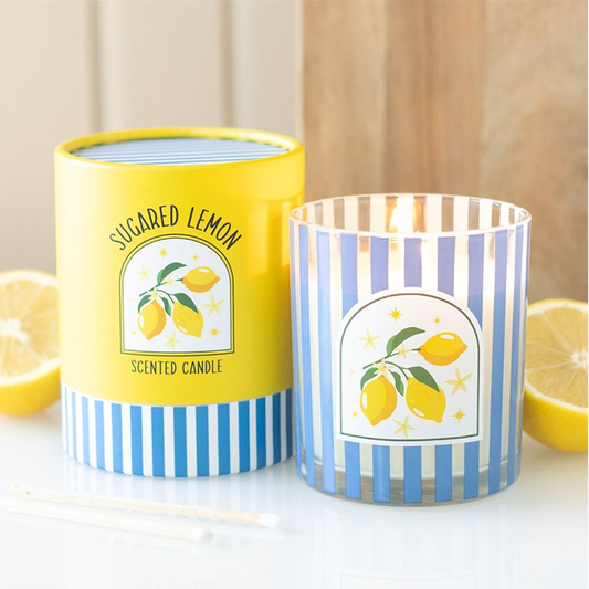 Sugared Lemon scented candles with striped containers on a white background