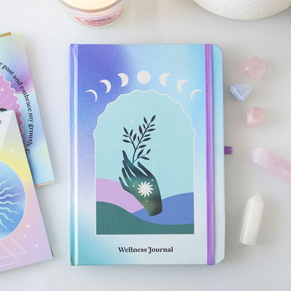 Wellness journal with a design on a white surface